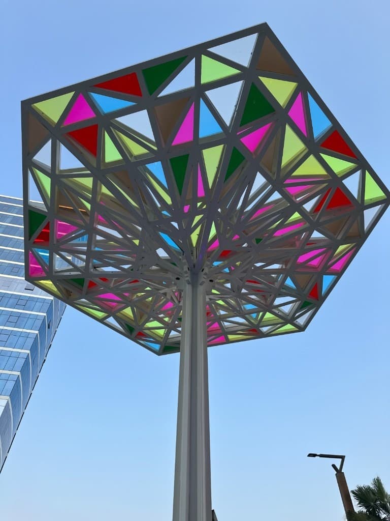 Geometric steel canopy with coloured panels by Royal Tents and Shades